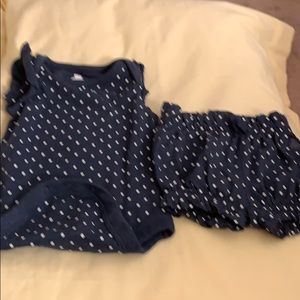 A cute pair of onesie and shorts for baby girl.